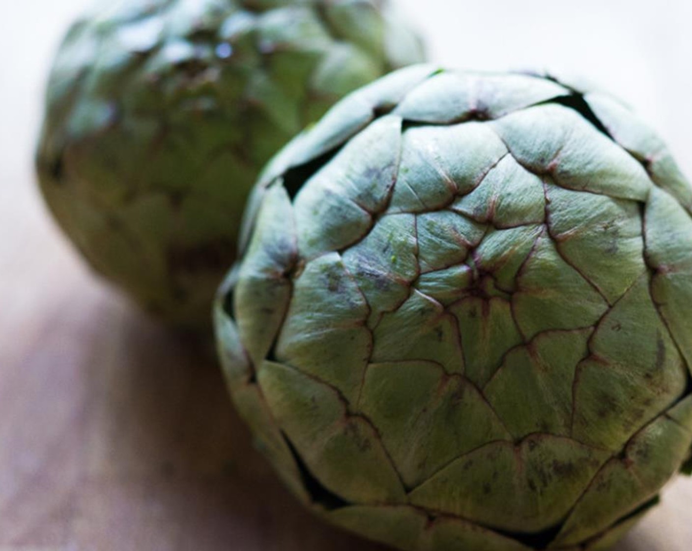 step 1 To blanch Artichokes (2), place them in a pot full of water. Add Salt (1 tablespoon) and juice of the Lemon (1) ( leave the lemon halves in the water). Bring to a boil, then simmer on low for 45 minutes.