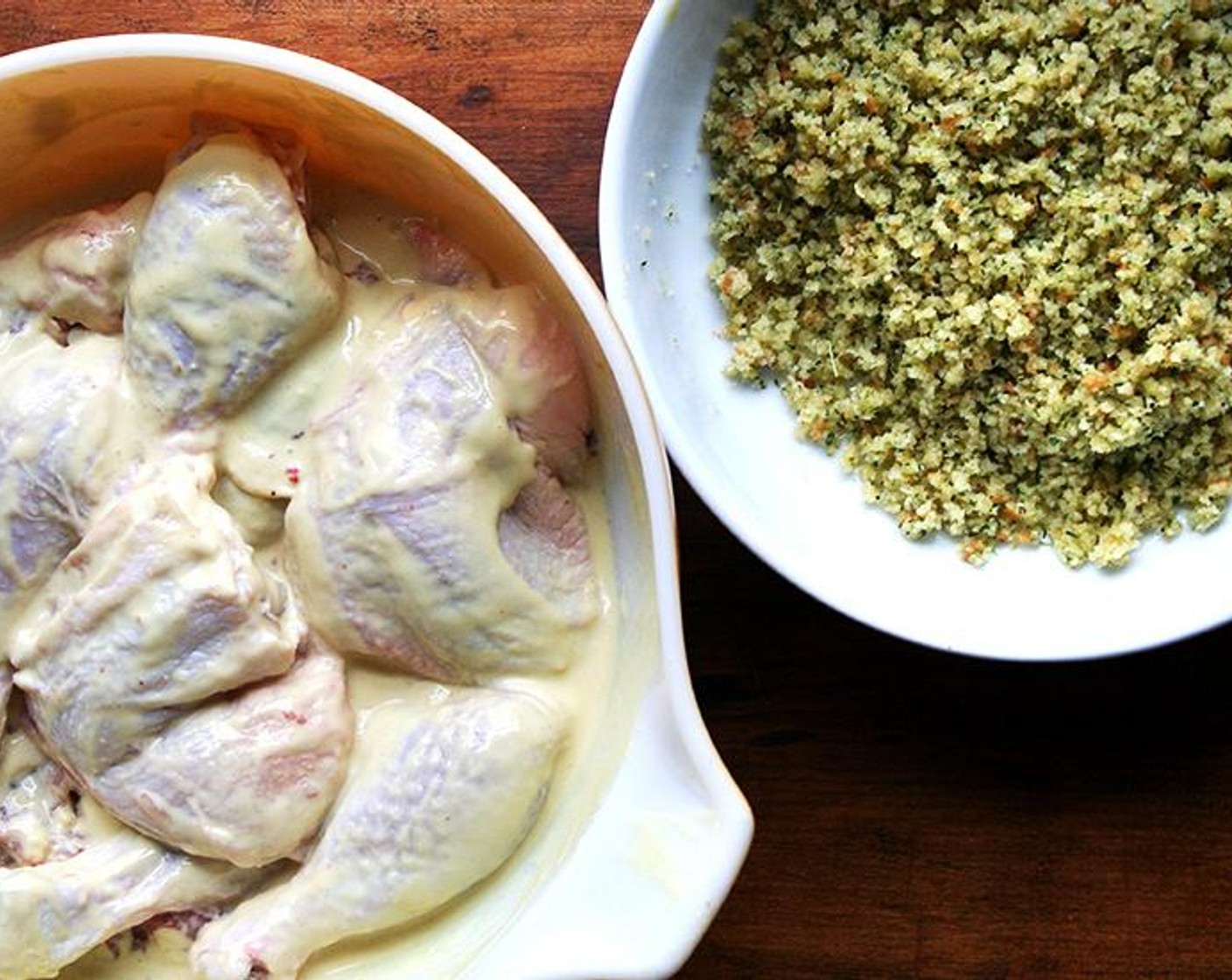 step 2 In a small bowl, whisk together the Dijon Mustard (1/2 cup) and Buttermilk (1/2 cup). Place the Bone-in, Skin-on Chicken Thighs and Drumsticks (8) in a large bowl and pour the mustard-buttermilk mixture over top. Toss to coat.