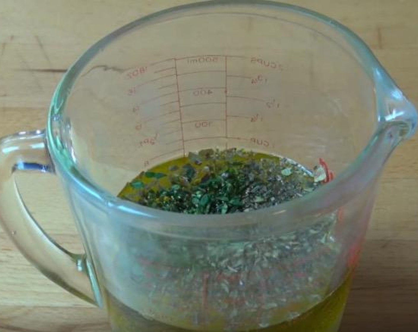 step 1 In a mixing jug, add Extra-Virgin Olive Oil (1/2 cup), Lemons (2), Fresh Oregano (1 Tbsp), and Fresh Thyme (1 Tbsp). Season with Salt (to taste) and Ground Black Pepper (to taste). Stir together.