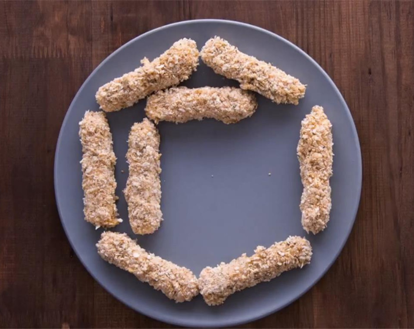 step 4 Coat the mozzarella cheese sticks in flour, then in the beaten eggs, then in the breadcrumbs. Double coat with egg and breadcrumbs. Do this for each mozzarella stick and freeze for at least 15 minutes before frying.