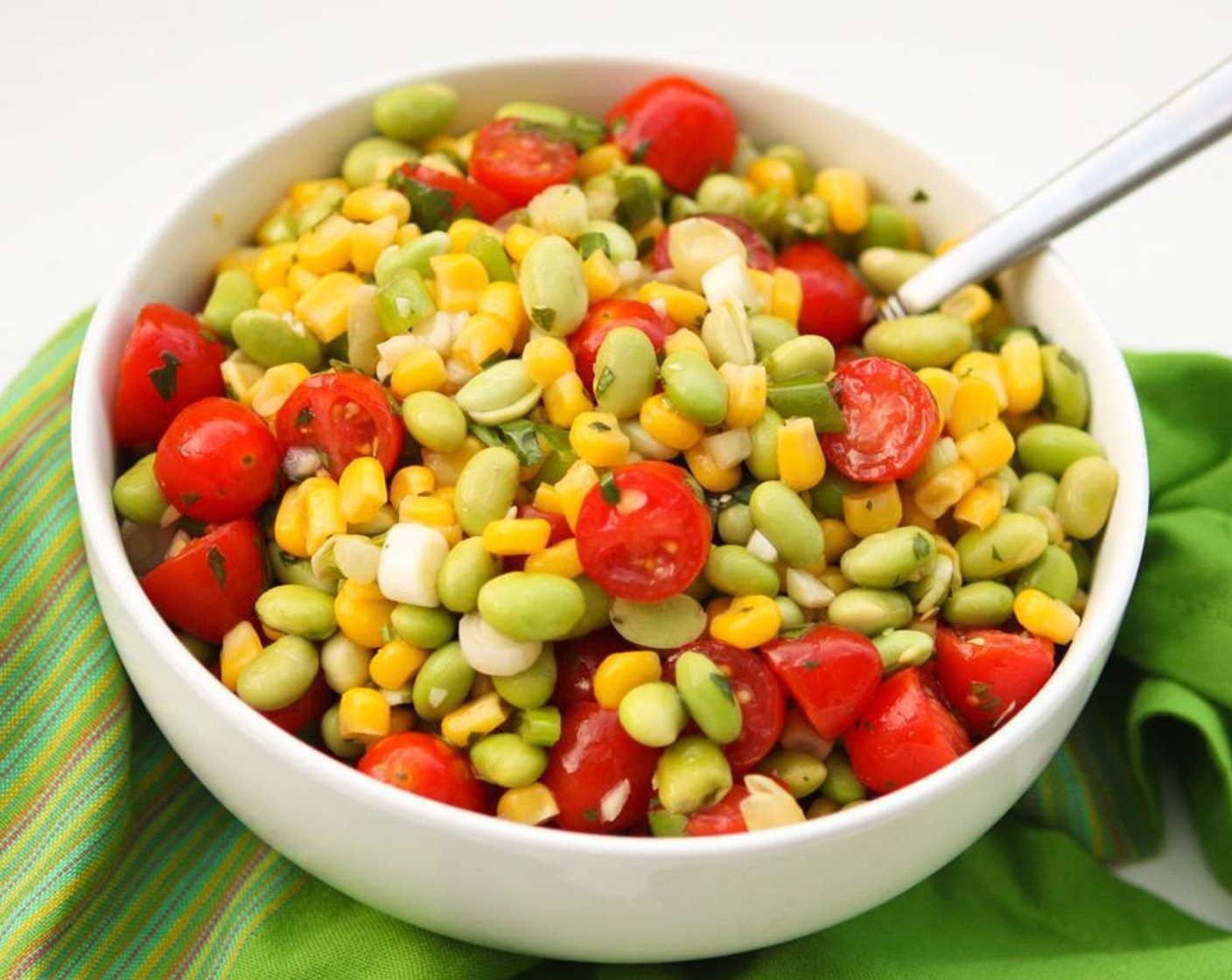 step 4 Drain well and pour into the bowl with the dressing. Gently mix in the Cherry Tomatoes (2 cups) and Scallion (1 bunch).