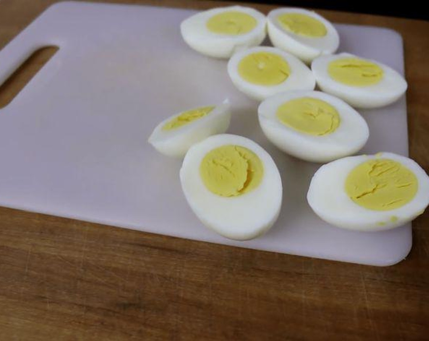 step 2 Run cold water over the eggs to cool and peel each egg under cold running water.
Slice each egg in half length wise and remove the yolk. Use a fork and mash the yolks together to a crumbled consistency. Add the Mayonnaise (1/2 cup), Sweet Pickle Relish (1/2 Tbsp), Yellow Mustard (1/2 Tbsp), Apple Cider Vinegar (1 tsp), Salt (1/2 tsp) and Ground Black Pepper (1/2 tsp) and gently stir until incorporated. Fill each egg half with a teaspoon of the yolk filling mixture.