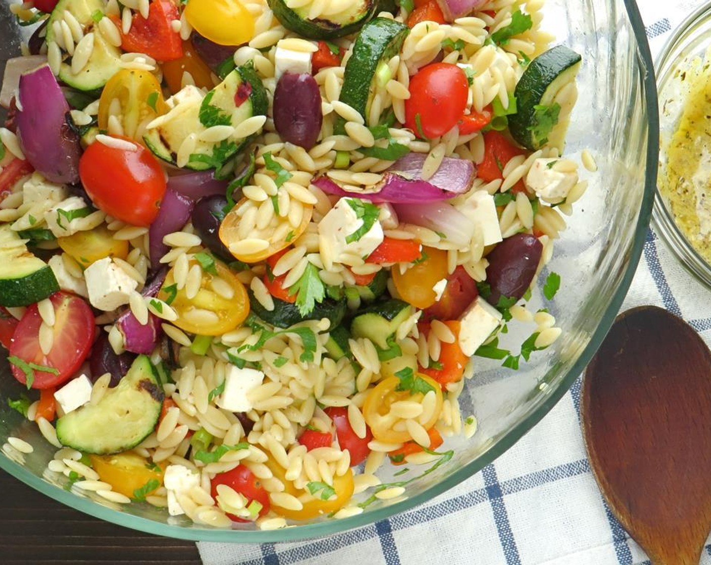 step 18 Stir together until dressing has emulsified. Add dressing to the orzo salad and toss to coat.