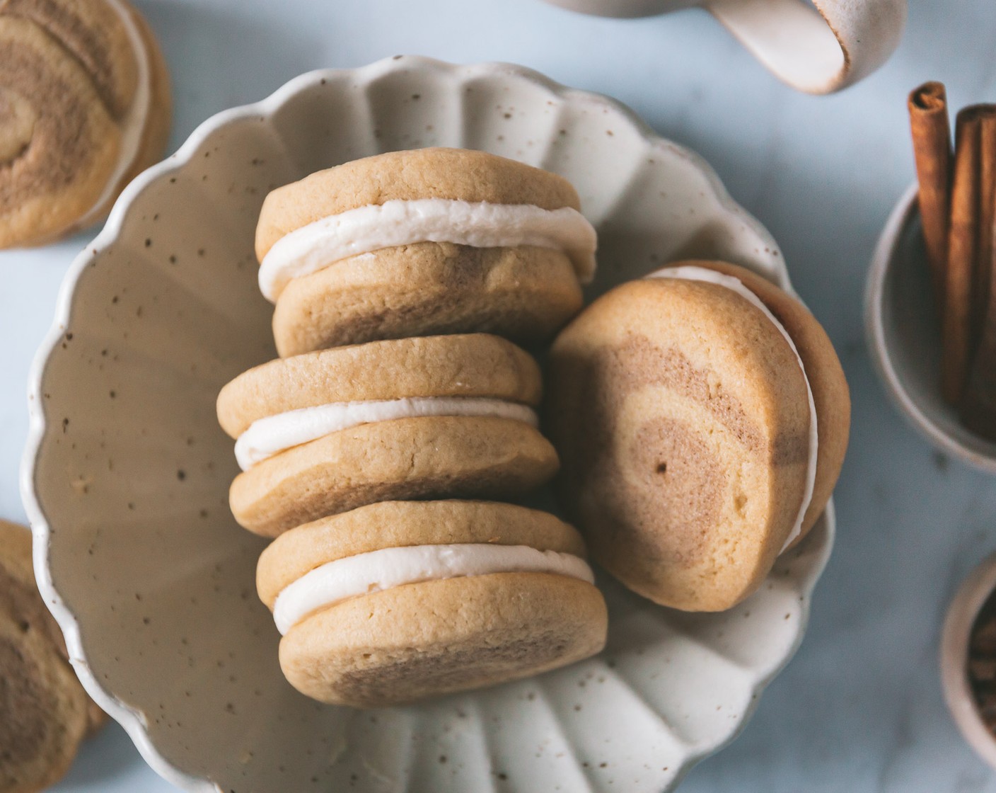 step 14 Squeeze about a tablespoon onto the bottom of one cookie, then sandwich the other cookie on top. Repeat with the remaining cookies.