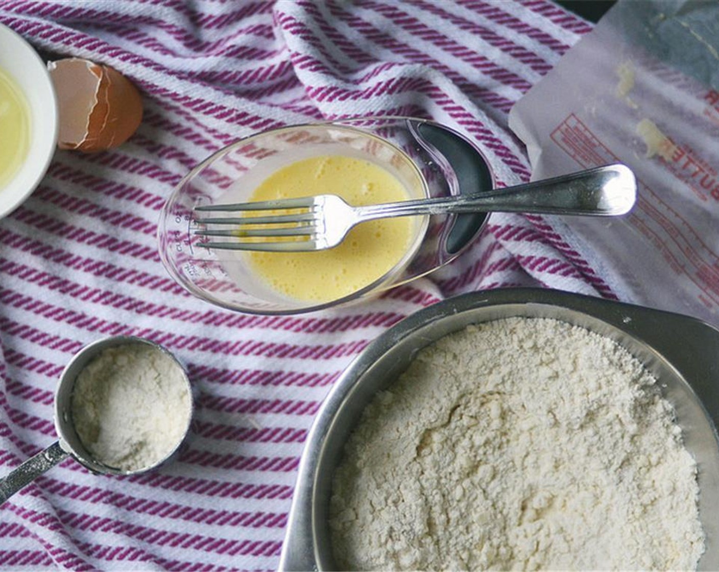 step 3 Using your fingertips, pastry blender, or food processor, break butter down into flour until butter is pea sized. If butter becomes too soft, just place in freezer for a few minutes and then return to working.