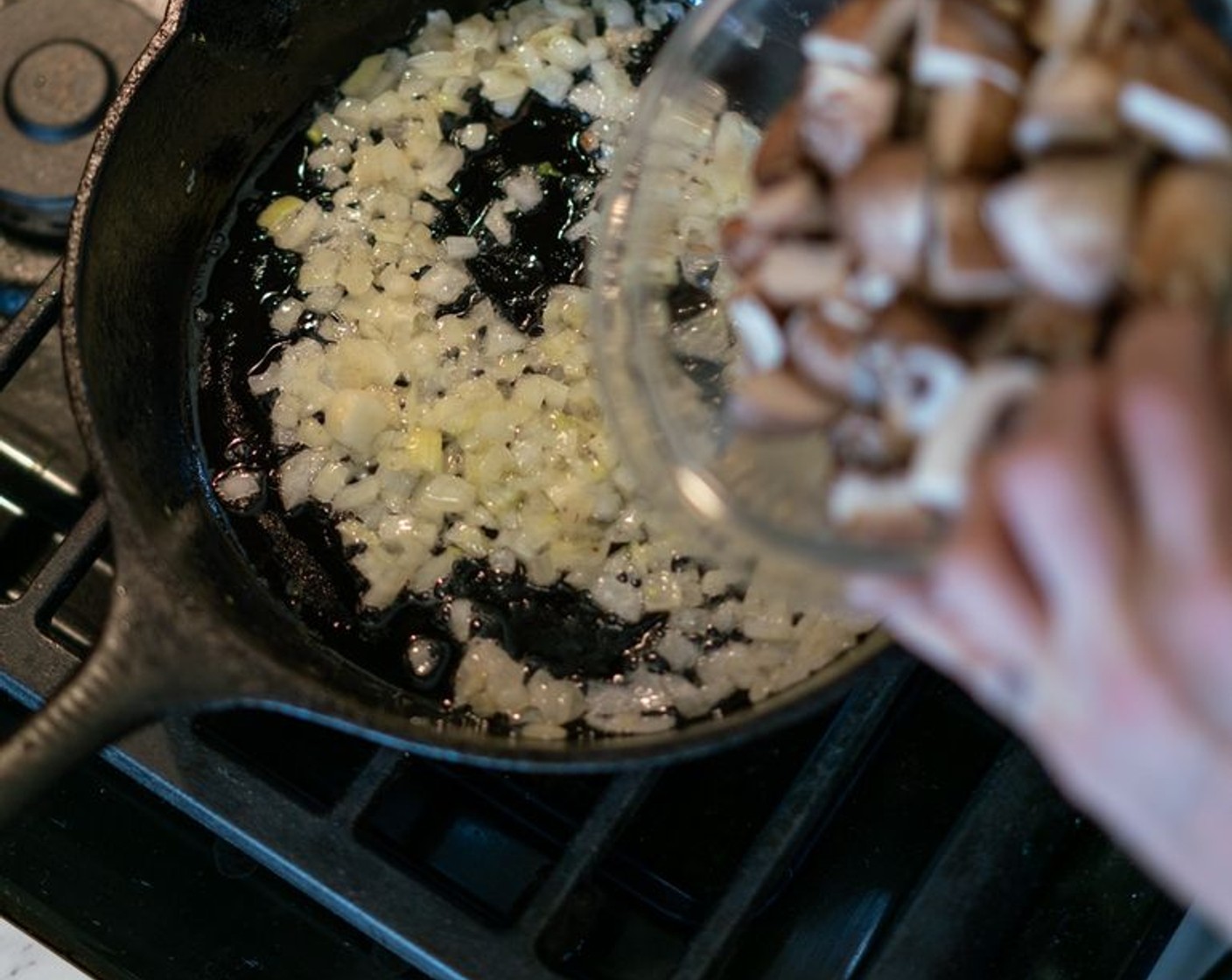 step 5 Add the Porcini Mushrooms (3 cups), Kosher Salt (1/2 Tbsp), and Freshly Ground Black Pepper (1/4 tsp) and cook, undisturbed, for at least 1 minute to help the mushrooms darken.