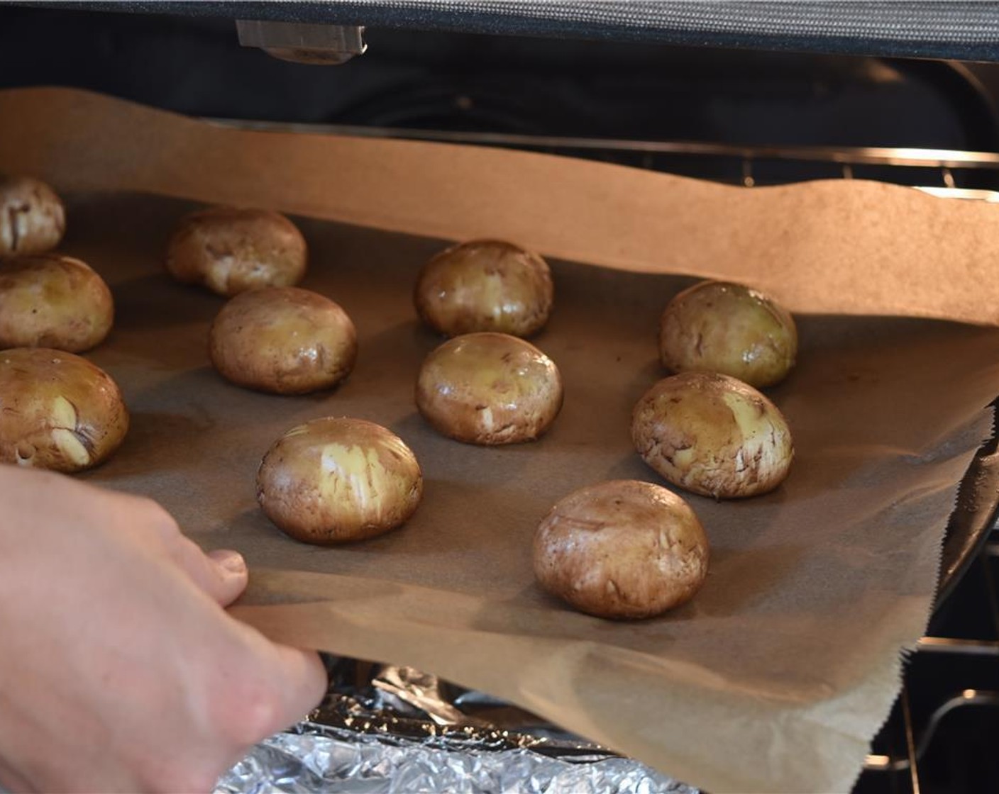 step 4 When the oven is hot, toss the remaining whole mushrooms with Olive Oil (2 Tbsp) and roast for 15 minutes.