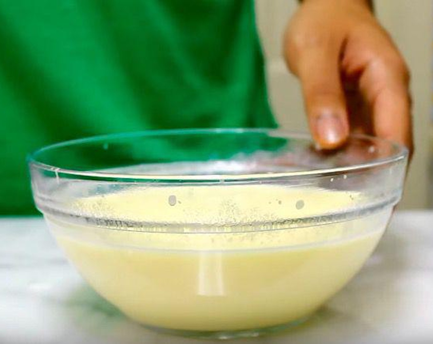 step 3 In a mixing bowl, add Farmhouse Eggs® Large Brown Eggs (2), Buttermilk (3/4 cup), and Whole Milk (3/4 cup). Whisk together until smooth.