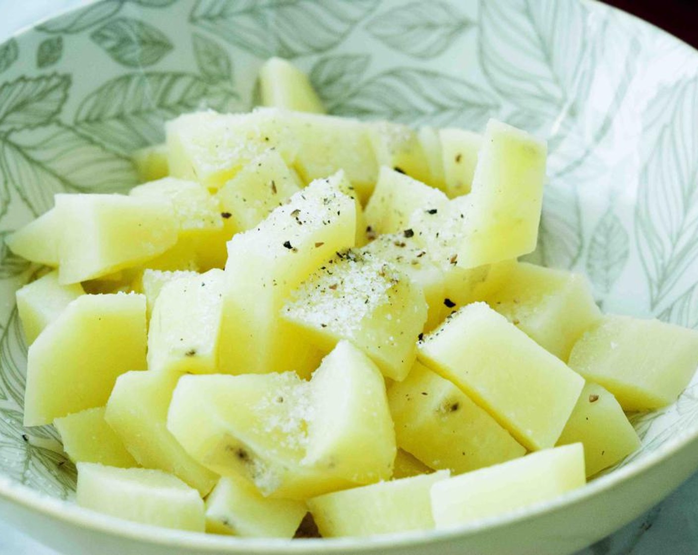 step 2 In a separate pot, boil the Potatoes (10.5 oz) until soft. Drain them once cooled and season with Salt (to taste) and Ground Black Pepper (to taste).