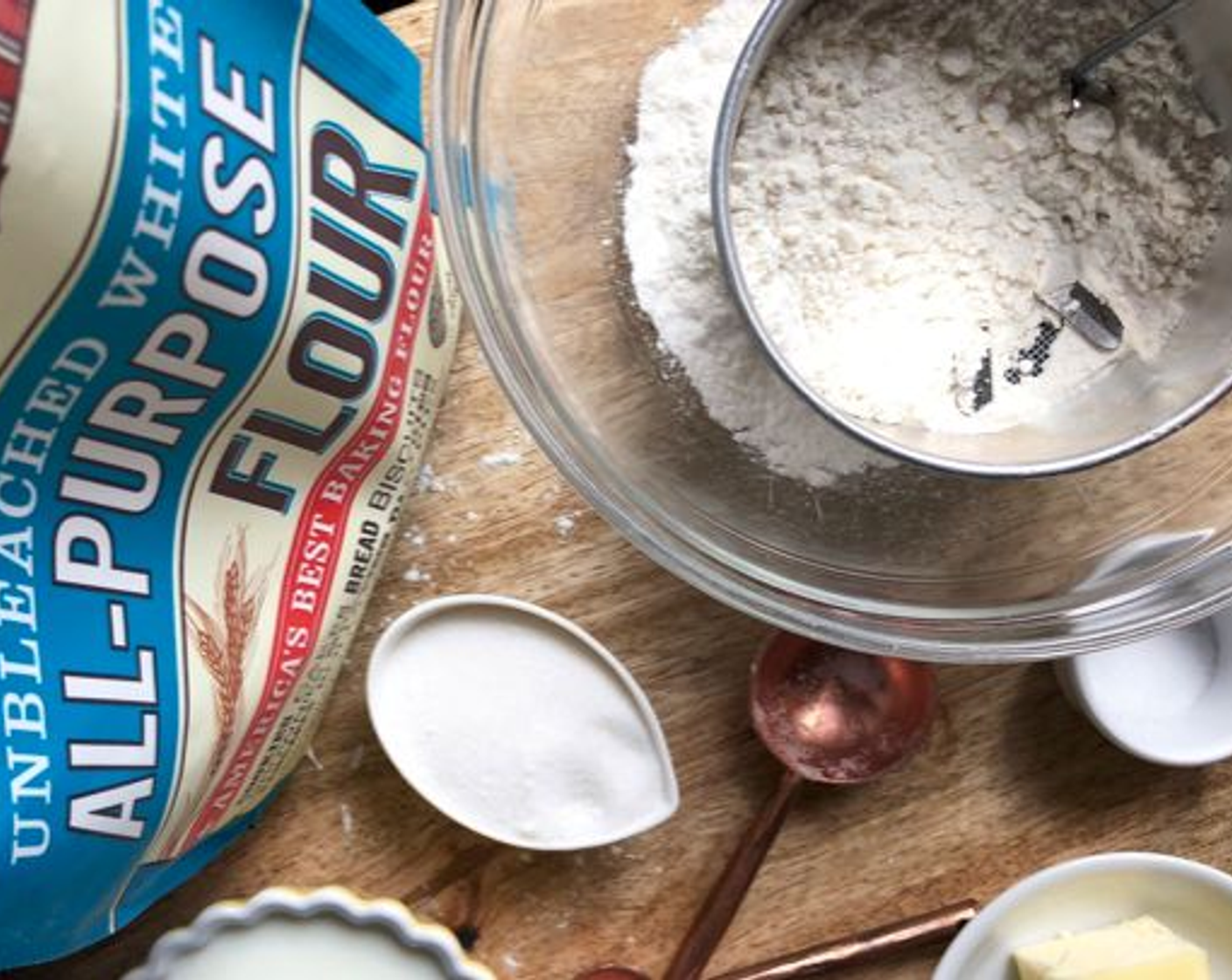 step 1 Sift All-Purpose Flour (1 1/2 cups), Baking Powder (1/2 Tbsp), Salt (1/2 tsp) and Granulated Sugar (3 Tbsp) into a large bowl.