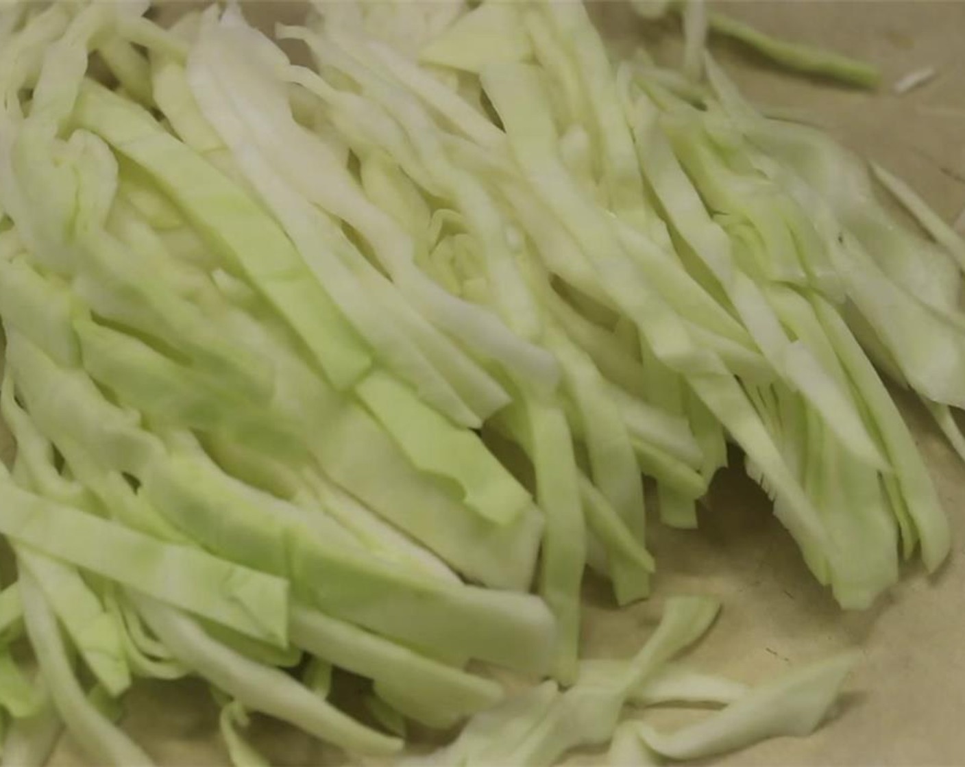step 5 Cut Green Cabbage (3.5 oz) into strips.