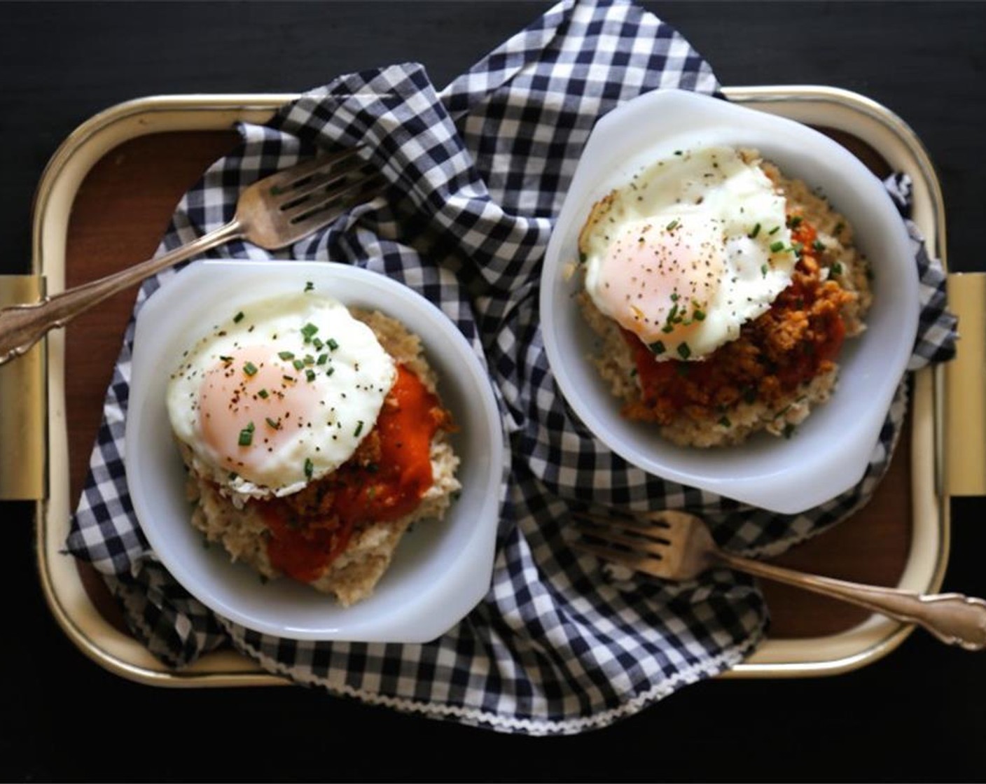 step 5 Top the oatmeal with tomato gravy, chorizo, and fried egg. Garnish with Fresh Chives (to taste) and enjoy!
