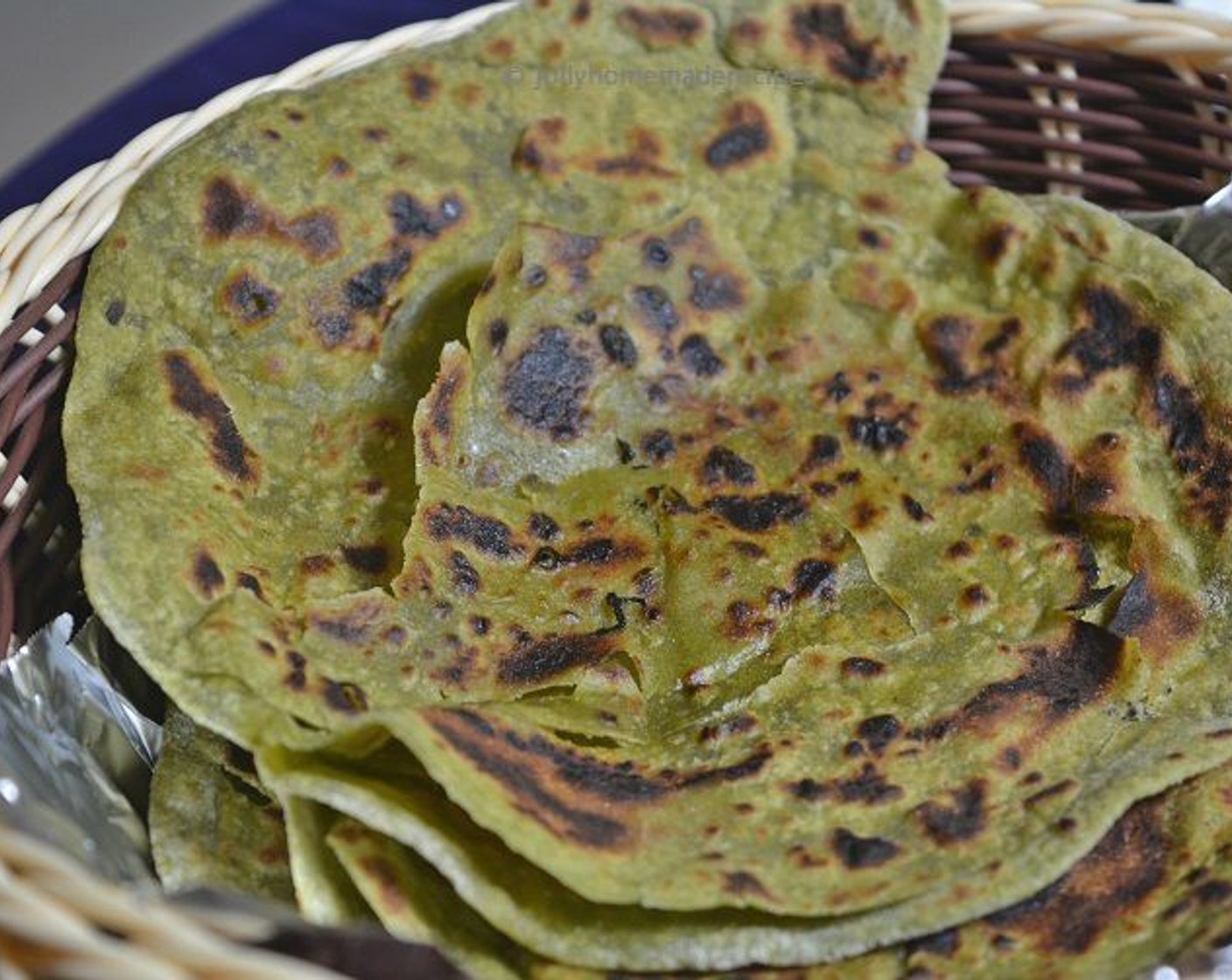 step 8 Serve hot palak paratha with aloo rasedar veggie or warm with mango pickle, yogurt or white butter or sweet lassi.