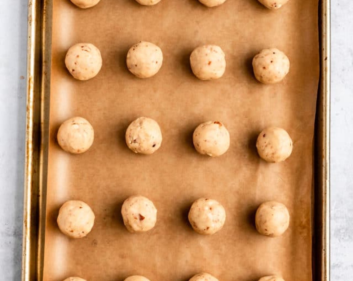 step 4 Shape into 1-inch balls and place 1-inch apart on baking sheets that are lined with parchment paper.