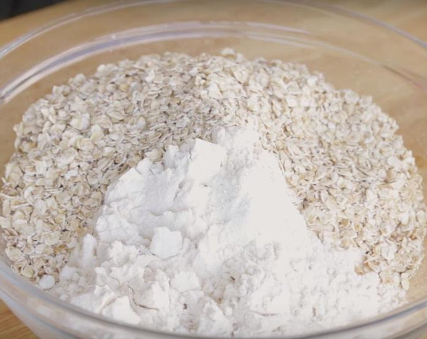 step 2 In a medium bowl, whisk together the All-Purpose Flour (1 3/4 cups), Quick Cooking Oats (1 cup), Baking Powder (1 tsp), Baking Soda (1/2 tsp), Simply Organic Cinnamon, Ground (1 tsp) and Salt (1/2 tsp). Add the flour mixture to the wet ingredients, mix until is well combined.