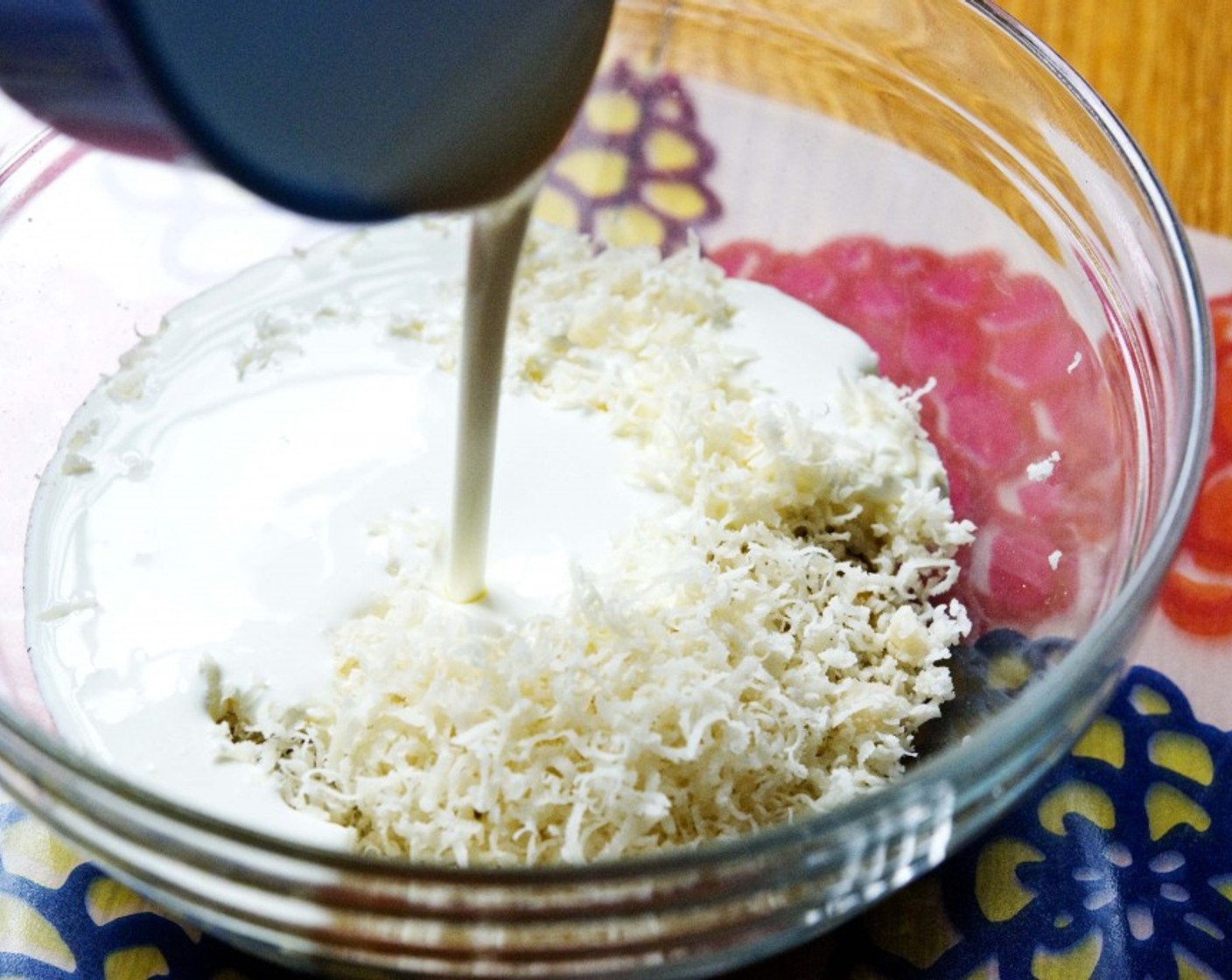 step 4 Meanwhile, in a bowl whisk together Egg Yolks (2), Heavy Cream (2/3 cup), Parmesan (1/2 cup), Salt (1 tsp), and Ground Black Pepper (1/2 tsp) until well combined.