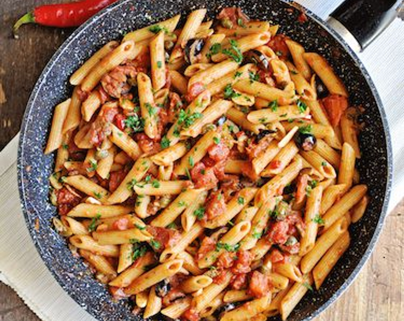 step 9 Once the water begins to boil add Whole Wheat Penne Pasta (2 cups) and cook until al dente, drain the pasta and add it to the pan with the sauce, mix it all together until well combined, remove from the heat and garnish with Fresh Parsley (1 handful). Enjoy!
