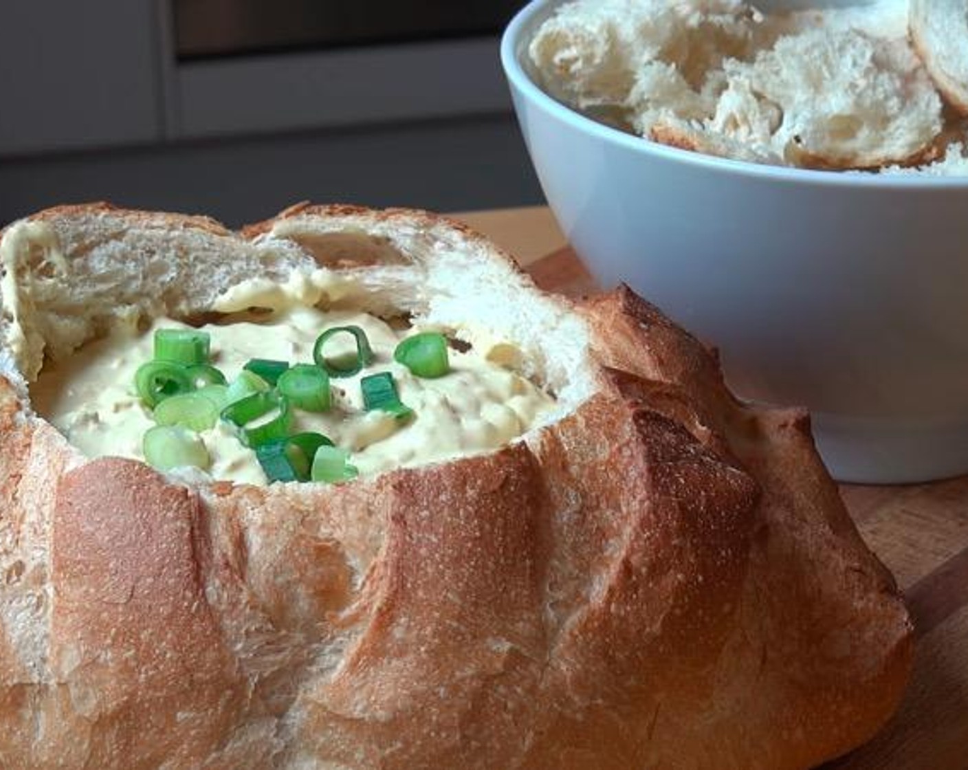 step 4 When the bread bowl is cool, spoon in the dip. Serve and enjoy!