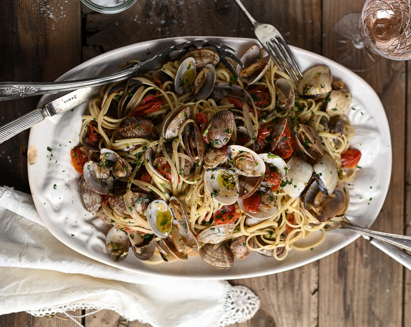 step 5 Cook the Linguine (to taste) or spaghetti as per the packet instructions. Once al dente, use tongs to transfer the pasta straight out of the water and into the casserole holding the clams. Gently stir the clams through the pasta and transfer them to a warmed serving dish.