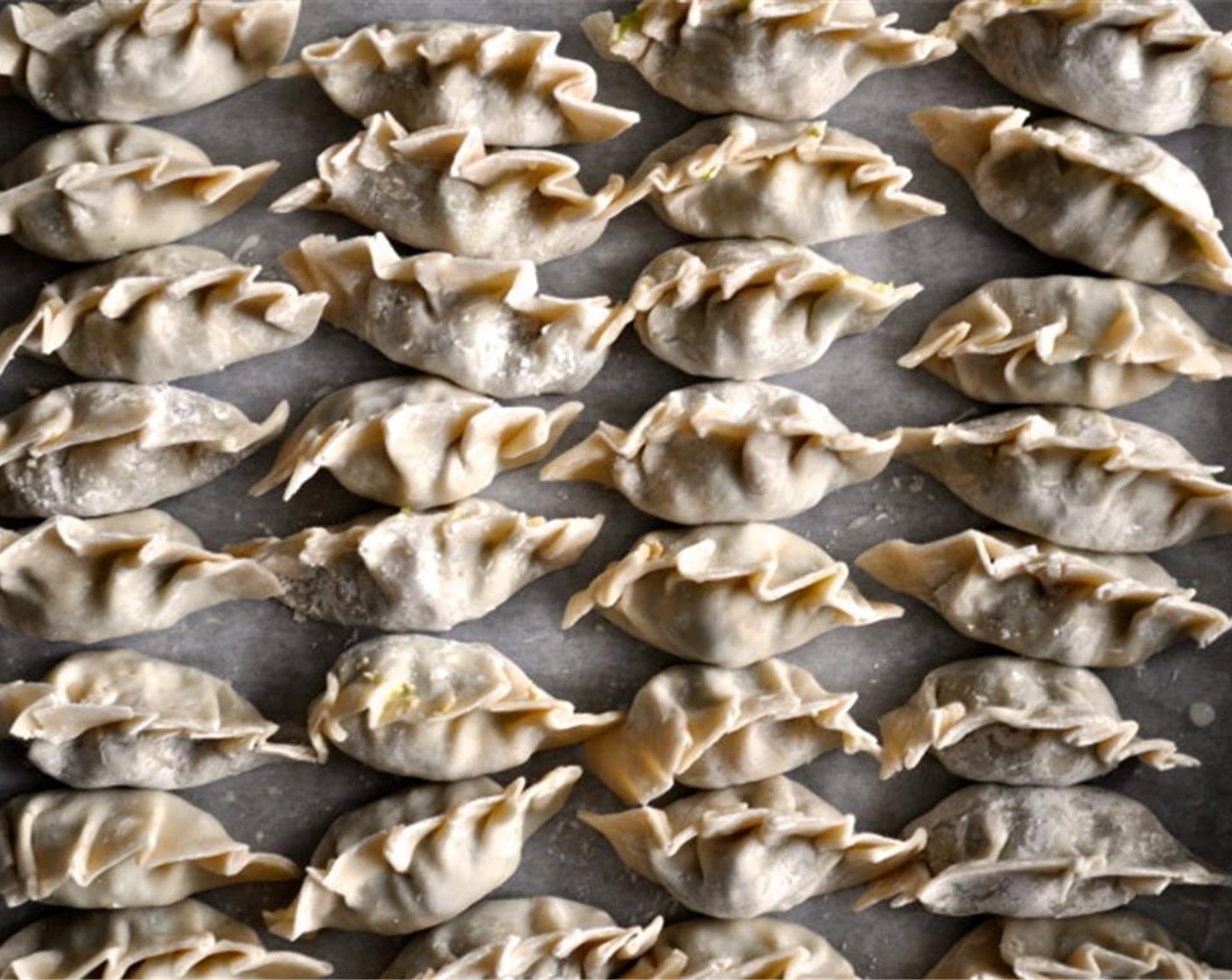 step 12 Place your potstickers in the pan with the oil, letting them brown and develop a crust, about 3 minutes.