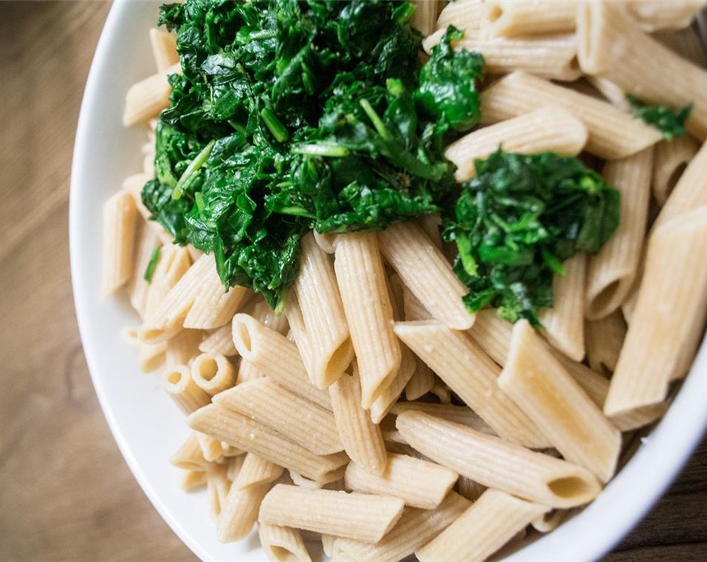 step 7 Cook Organic, Whole Wheat Penne Pasta (1 pckg) according to package directions, and sauté chopped spinach until cooked. Drain pasta, then add it back to the pot. Add organic baby spinach and butternut squash sauce.