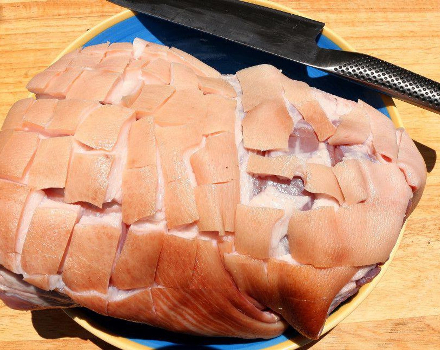 step 1 Cut the Boneless Pork Shoulder (1) skin into 1-inch squares.