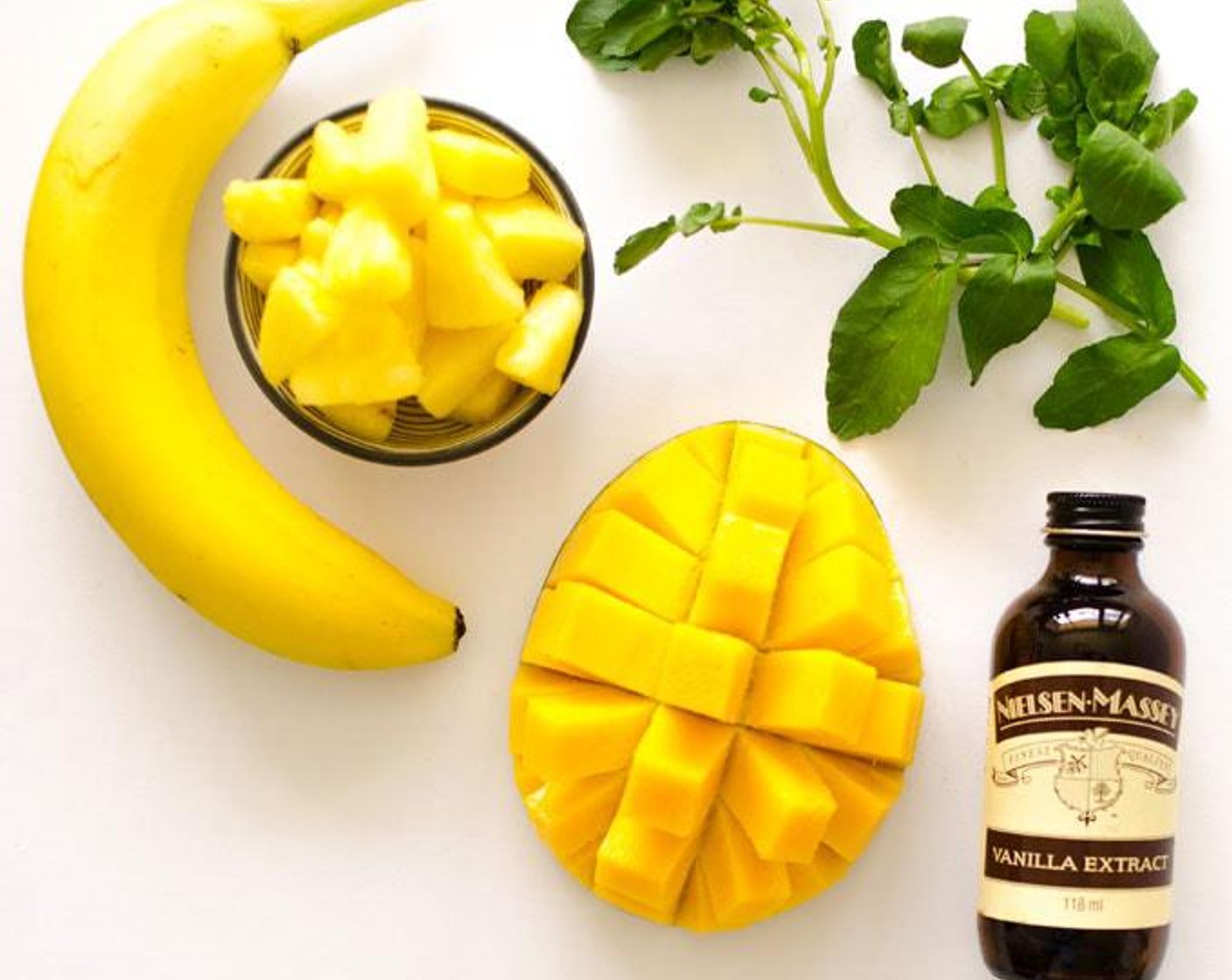 step 1 Blend Watercress (1 cup) and Oranges (3) until smooth, then add the rest of the ingredients. The rest of the ingredients include Pineapple (1/2 cup), Mango (1/2 cup), Banana (1) and  Vanilla Extract (1 tsp).