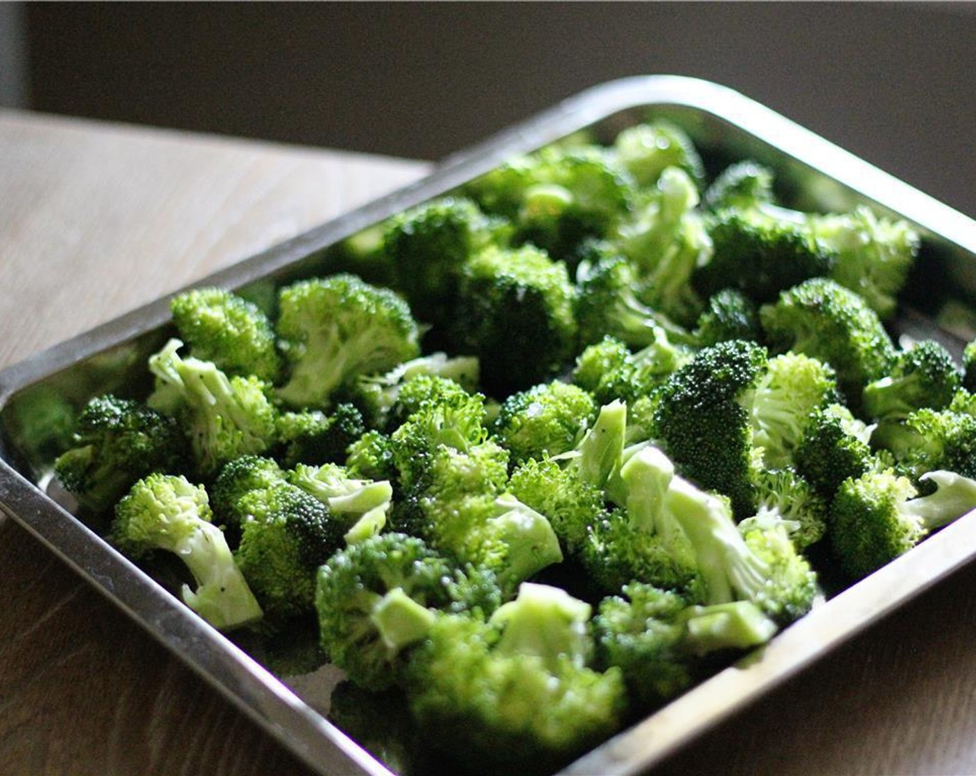 step 2 Cut Broccoli (5 cups) into spears or bite sizes pieces and place into bowl with Olive Oil (2 Tbsp), Garlic (2 cloves), Salt (to taste) and Black Pepper ( to taste) toss ingredients together to coat broccoli, Balsamic Vinegar (1/2 cup) and Fresh Thyme (1/2 Tbsp) set aside.