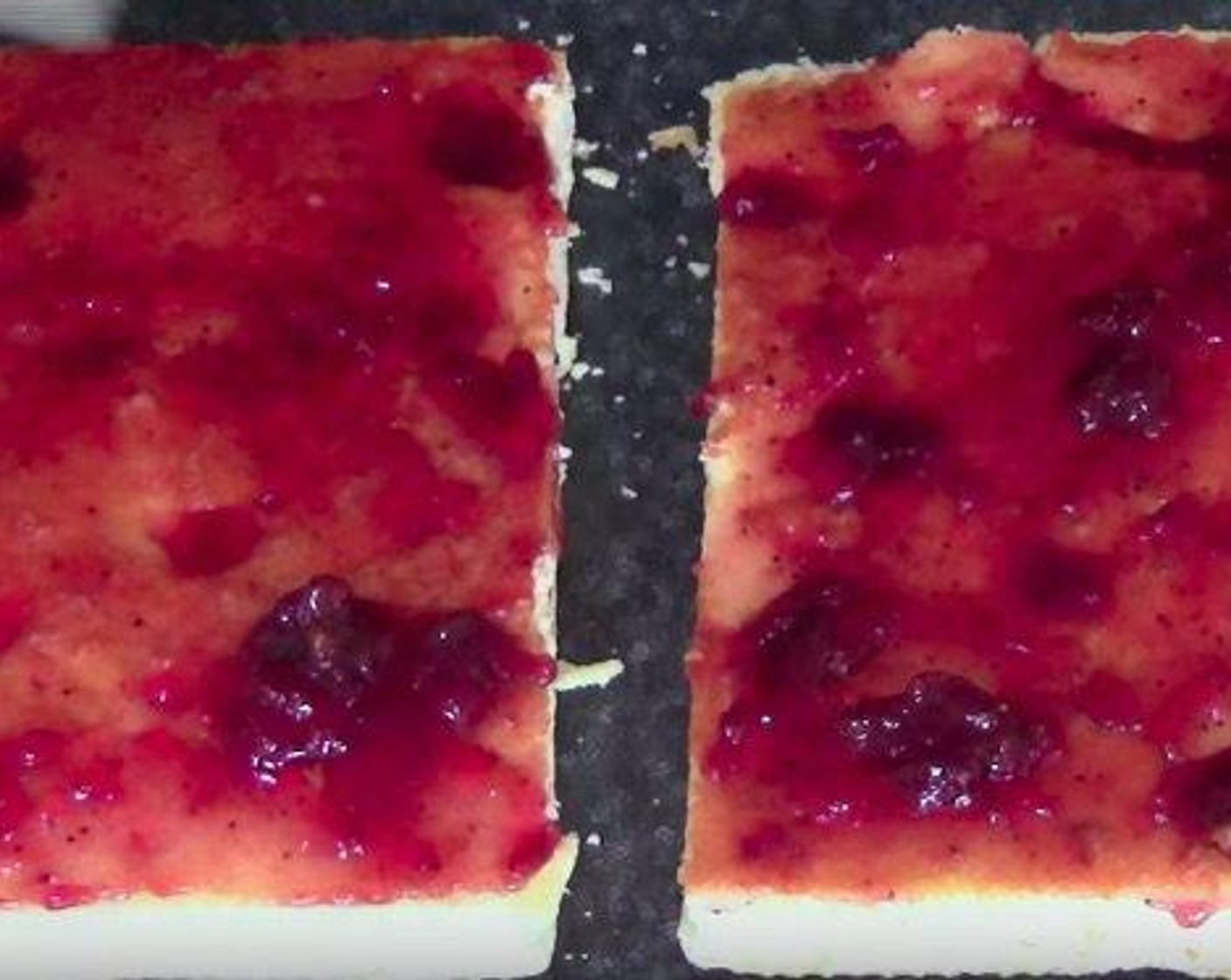 step 1 Slice the Sponge Cake (2) into four pieces. Spread a generous portion of Strawberry Jam (1 cup) onto each one. Place the top of the sponge cake on top and use a sharp knife to cut them into squares. Set aside
