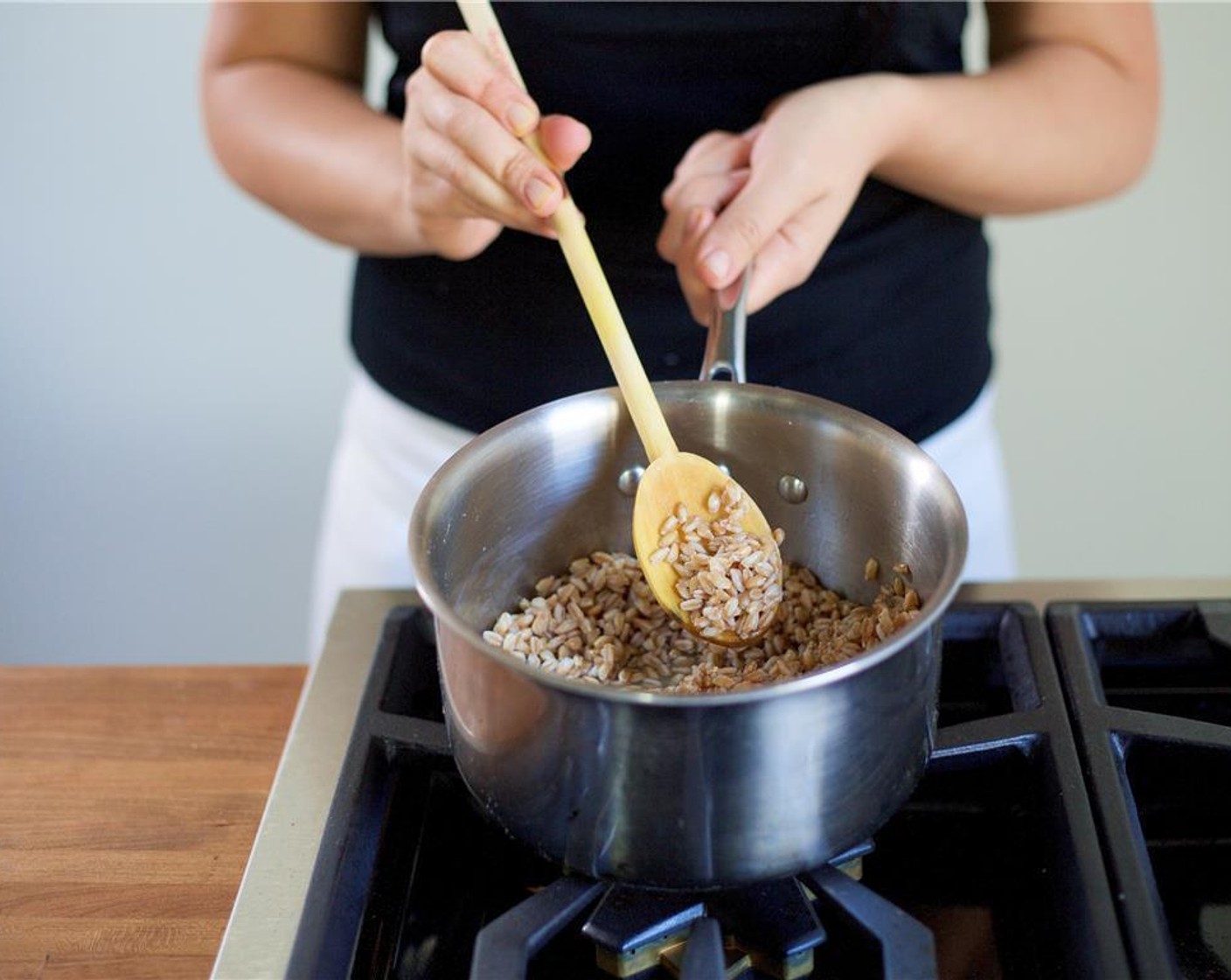 step 2 In a small saucepan over high heat, add two cups of water and Salt (1/2 tsp) Bring to a boil. Add Farro (2/3 cup), cover, and cook for fifteen minutes. When farro is finished, drain and set aside.