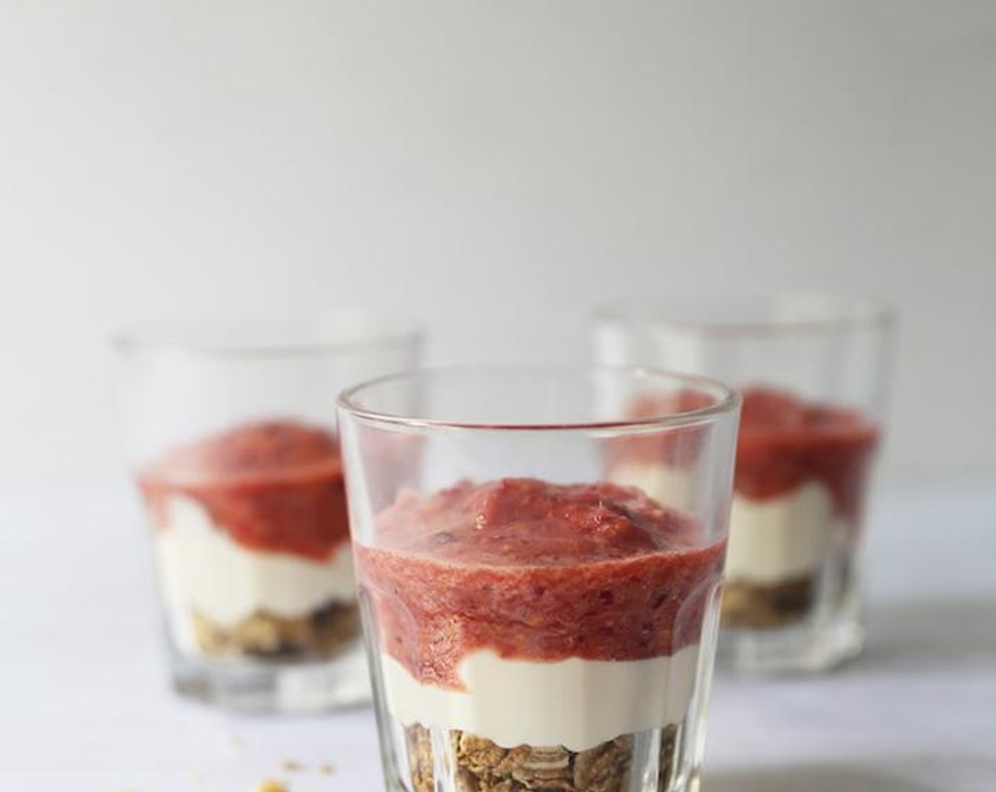 step 2 Divide the Granola (1 cup),Greek Yogurt (to taste) and smoothie in alternating layers in glasses