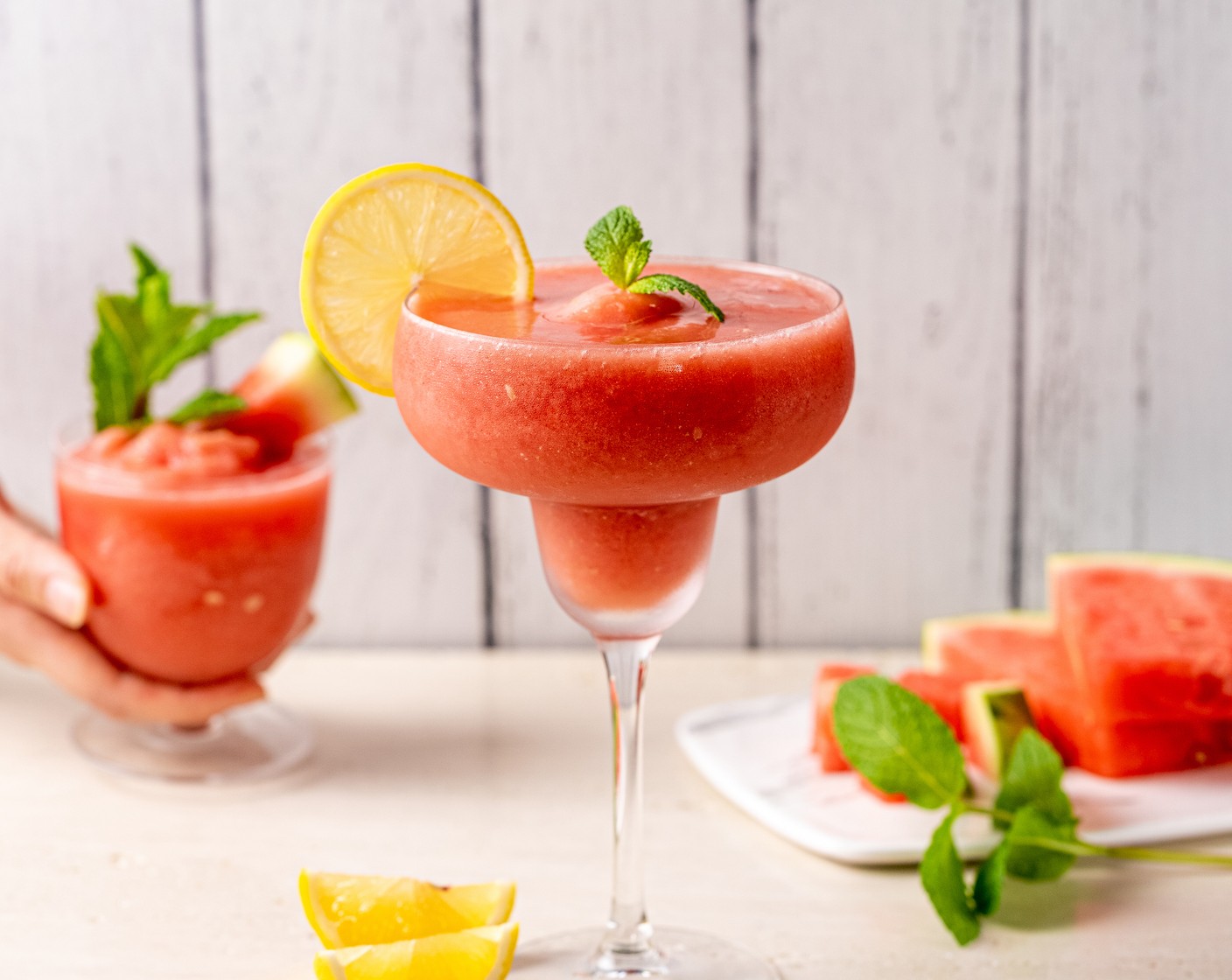 step 5 Pour the slushie into a glass and garnish with a Lemon Wheel and Fresh Mint (as needed).