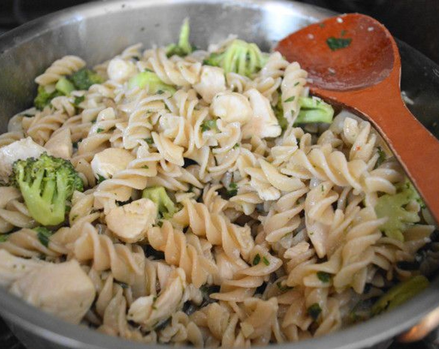 step 14 Drain the pasta and add it to the pan of aglio olio sauce and toss everything thoroughly to combine, then remove from heat.