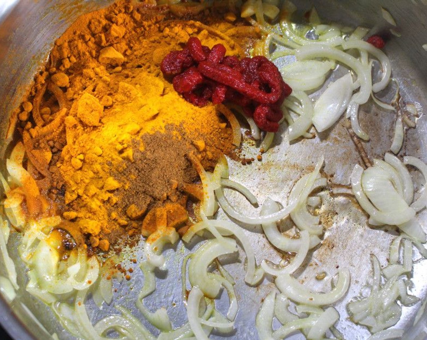 step 8 Add Tomato Paste (2 Tbsp), Madras Curry Powder (2 Tbsp), Ground Turmeric (1 Tbsp), Garam Masala (1/2 Tbsp), and Kosher Salt (to taste). Sauté until fragrant.