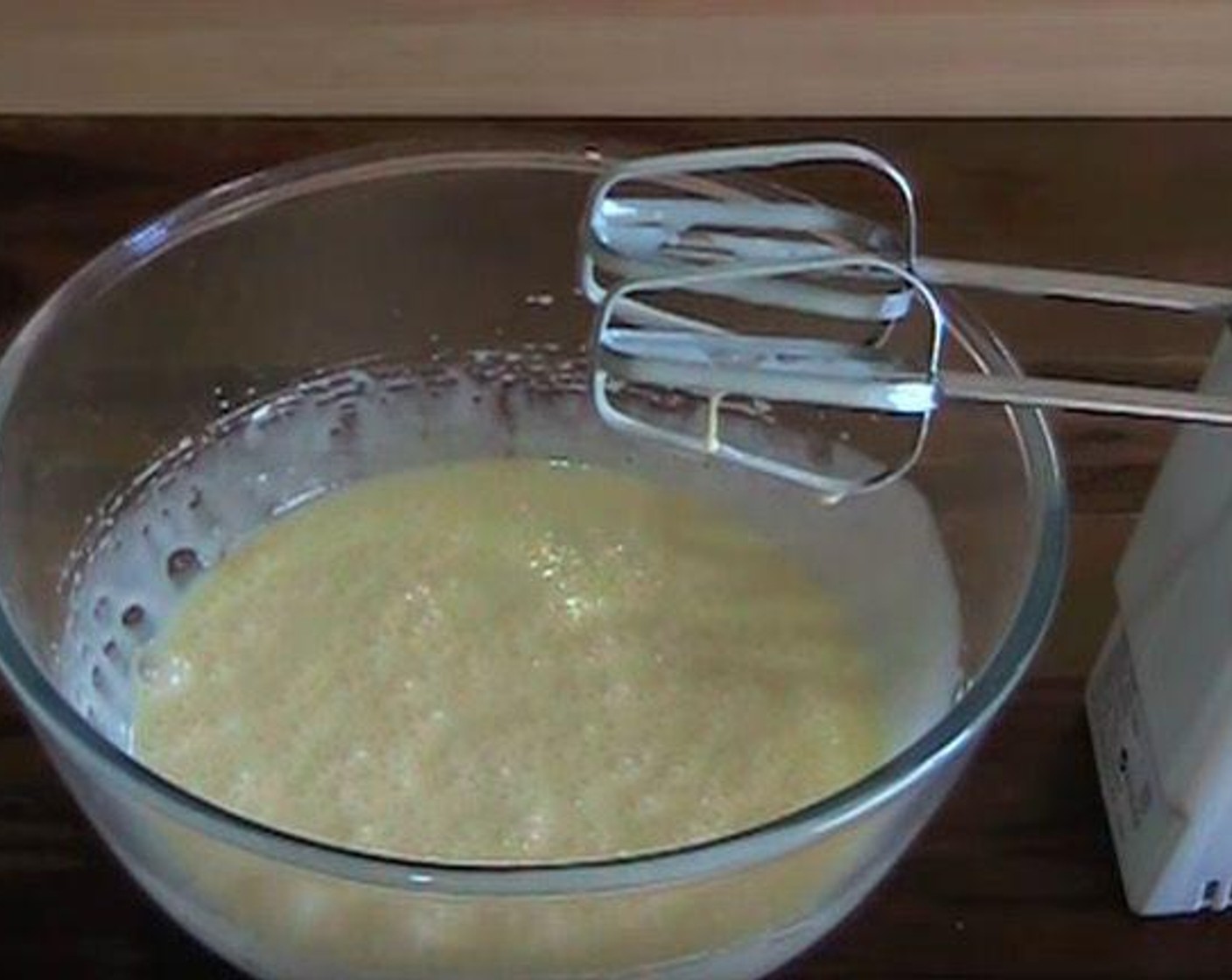 step 5 In a mixing bowl, add Sweetened Condensed Milk (1 1/3 cups) and Egg (1). Beat together until smooth. Add Self-Rising Flour (2 Tbsp) and juice from Lemons (3). Mix again.
