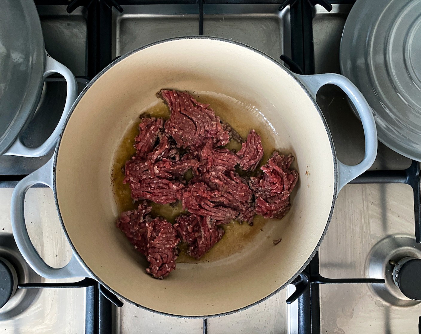 step 3 Heat the Olive Oil (1 Tbsp) and brown the Ground Beef (1 lb) until separated and crumbly.