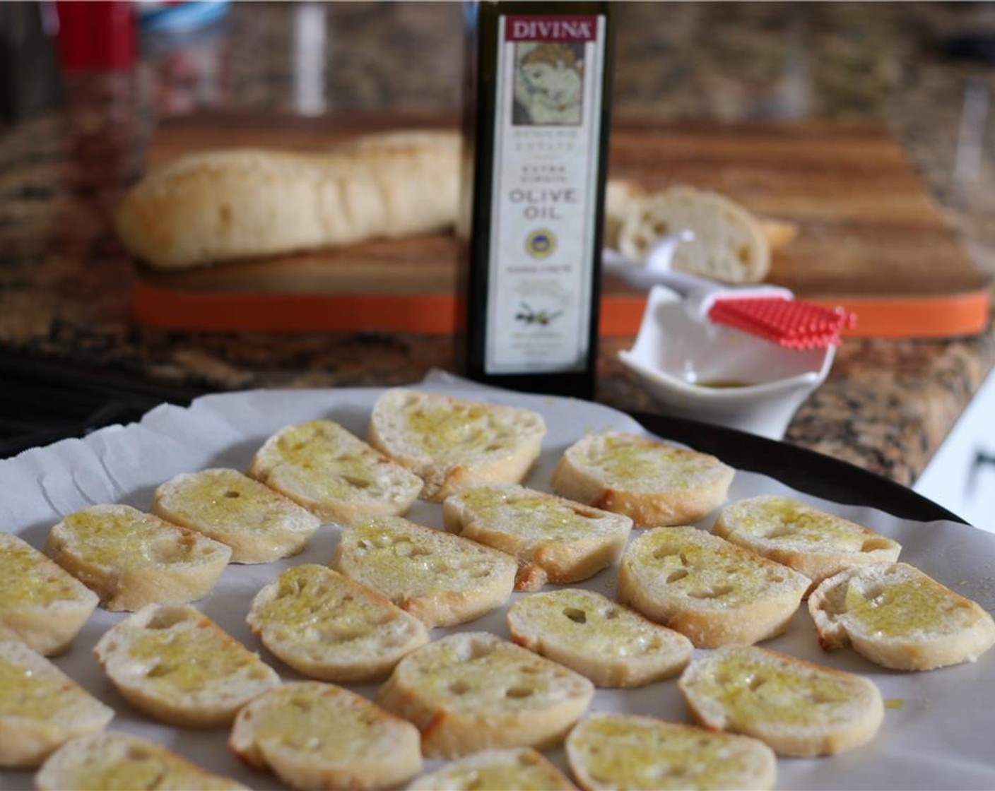 step 1 Preheat the oven to 400 degrees F (200 degrees C). Slice the Baguette (1) into rounds.