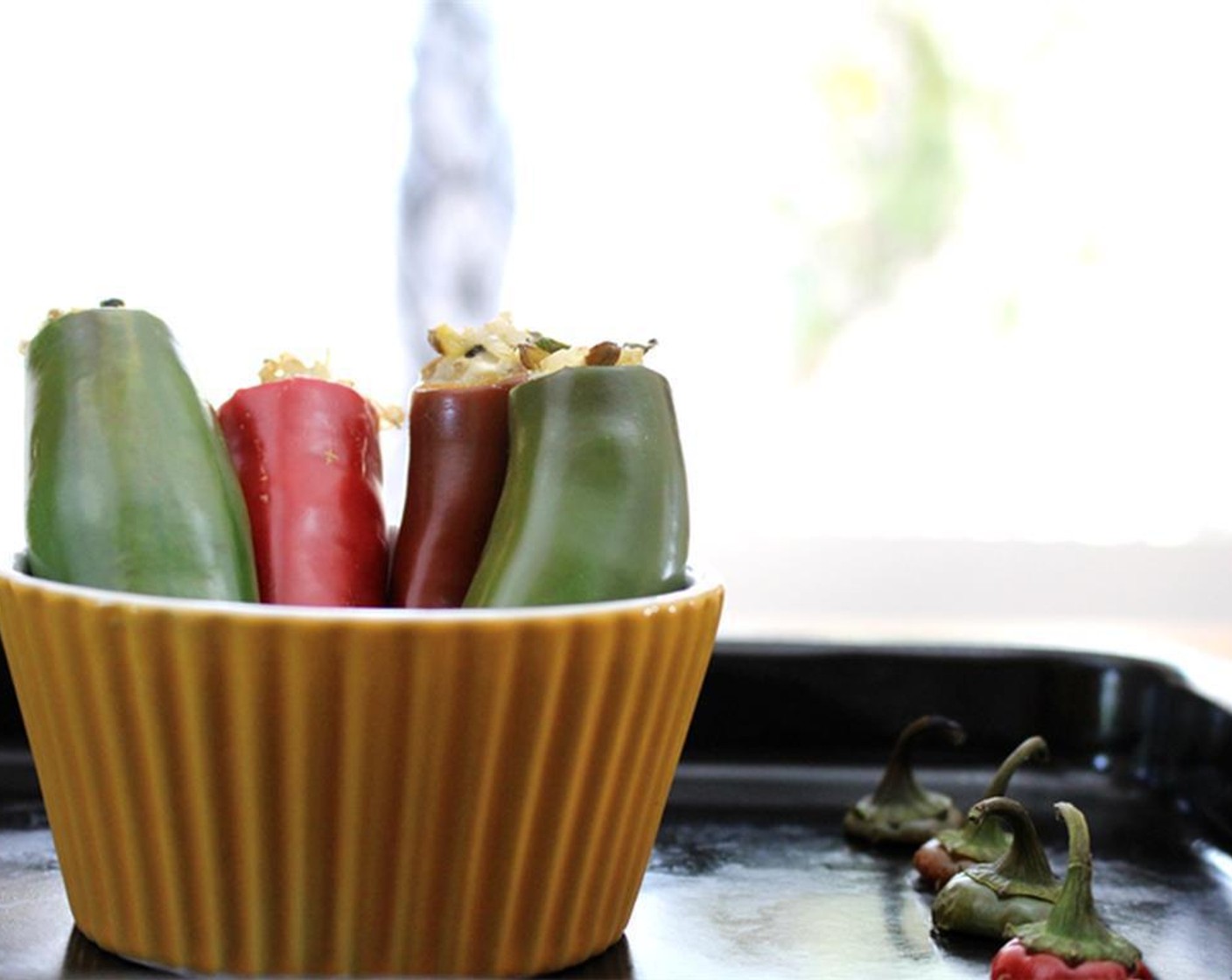 step 6 Stand in a small ramekin and place on a baking sheet or lay flat on a baking sheet (some filling may spill out). Roast for about 30 to 60 minutes, or until peppers have softened slightly.