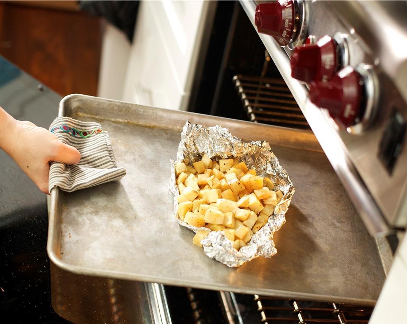 step 7 Pour the parsnip mixture onto a large piece of foil, and wrap it into a tight bundle. Place the bundle on a sheet pan and roast in the oven for 15 minutes.