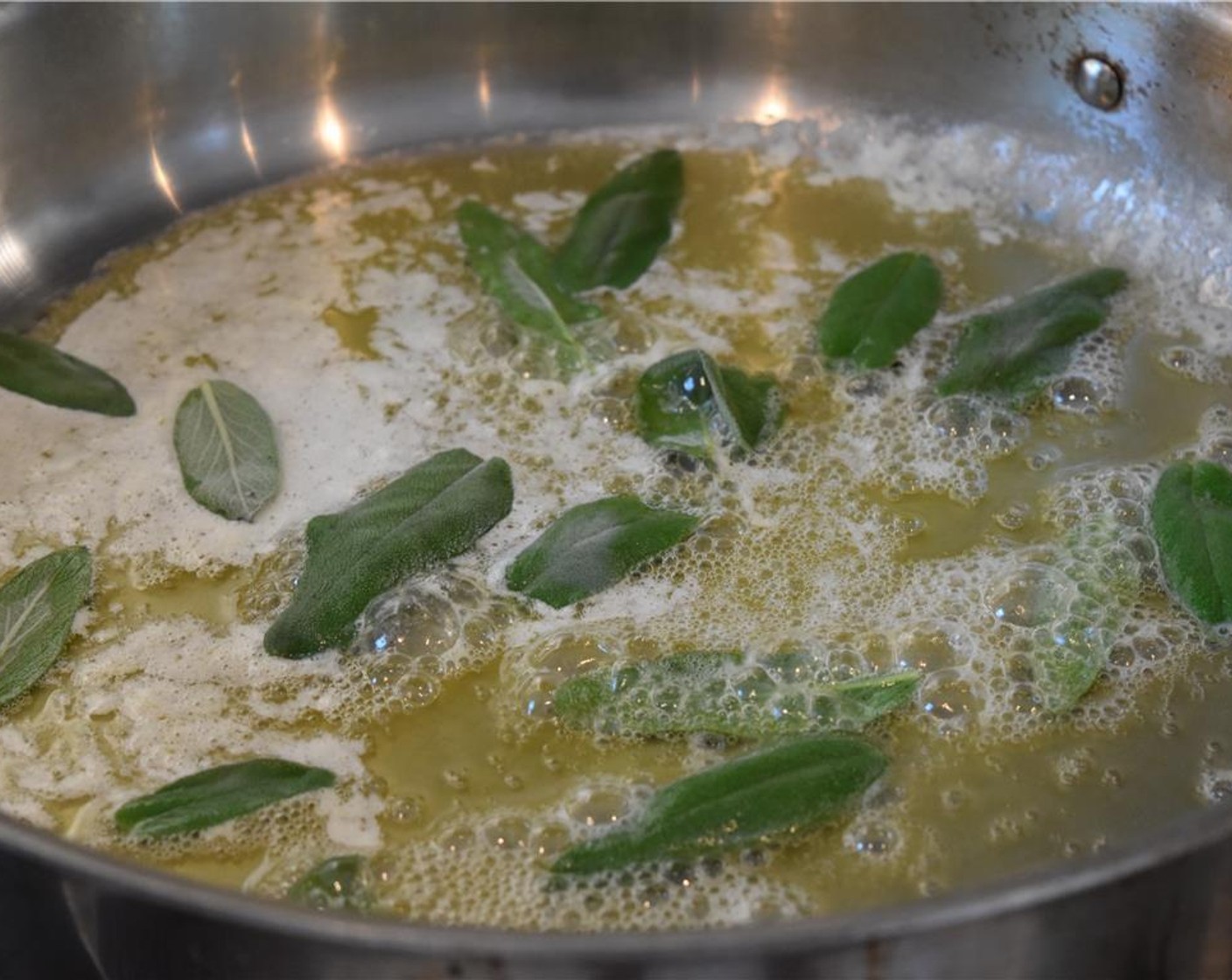 step 6 Add the sage leaves to the skillet and coat with the butter. Fry them for 3 to 5 minutes. They're done when the butter begins to brown and the sage leaves are very fragrant.