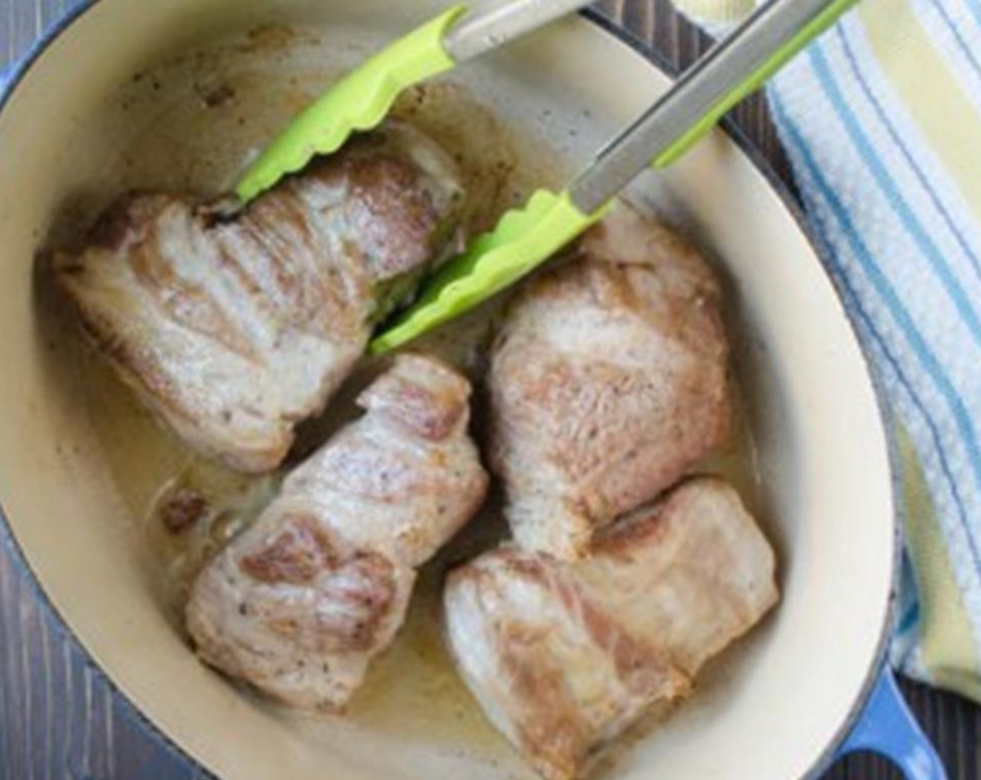 step 3 In a dutch oven over medium-high heat add the Olive Oil (2 Tbsp). When oil is hot, add the chunks of pork and brown it on all sides, turning every so often - this should take 10-12 minutes.