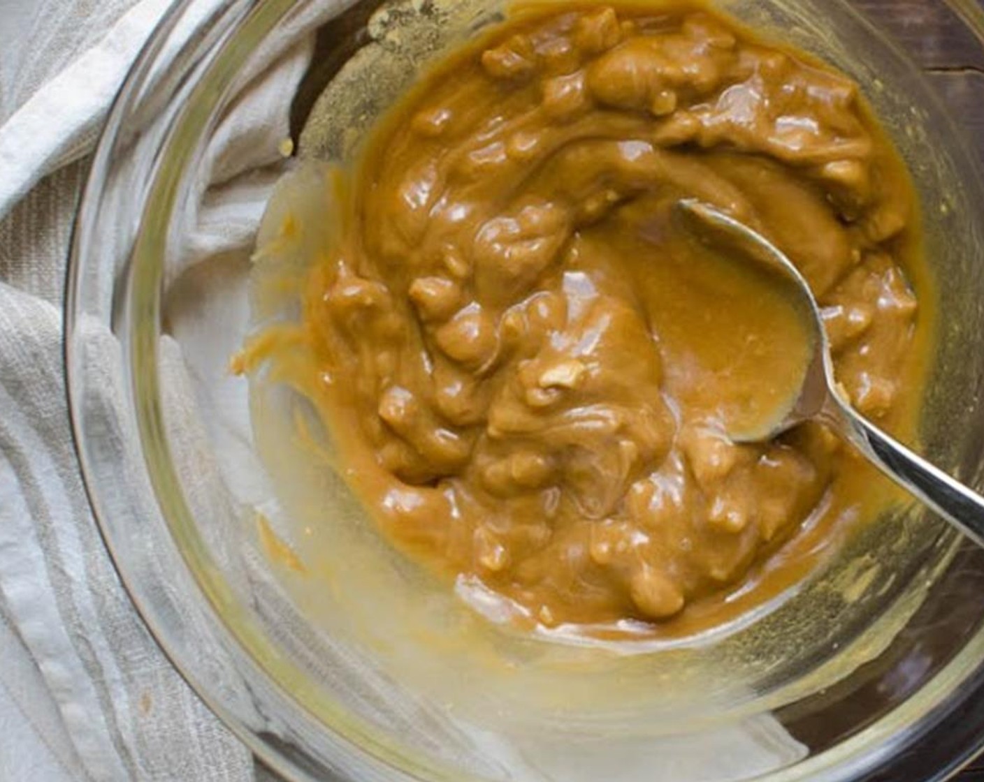 step 2 Add the Almond Butter (1/2 cup), Almond Extract (1 tsp), and Honey (3 Tbsp) to a small bowl. Microwave in 10 second bursts to soften the almond butter and make it easier to stir.