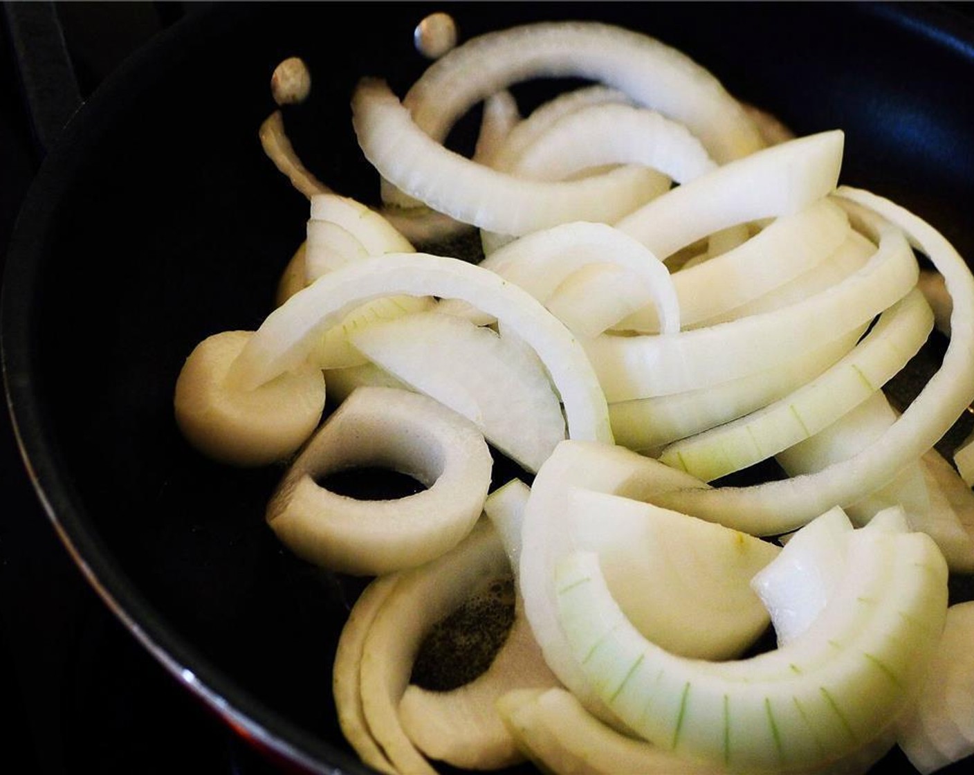 step 4 Place the onion into the pan. Sauté, stirring occasionally, for 15 minutes.