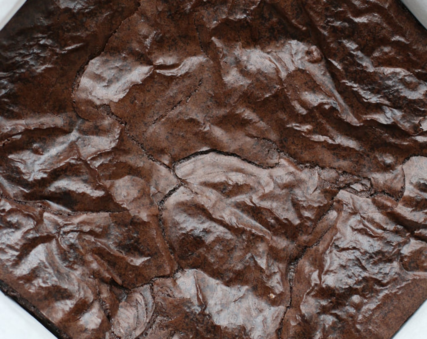 step 6 Allow brownies to cool completely in the pan. As soon as they reach room temperature, cover the pan with plastic wrap to retain moisture in the brownies.