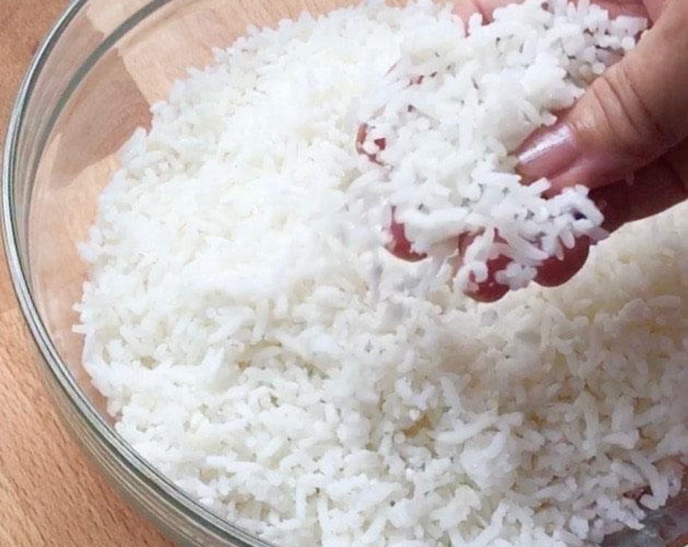 step 1 Wet your fingers and run through the White Rice (1 cup) to remove any clumps.