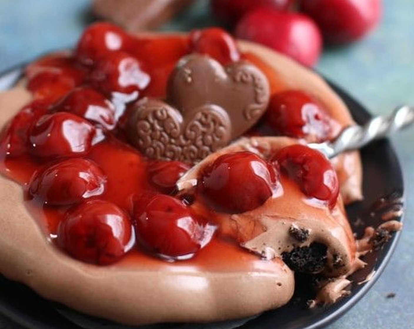 step 11 Use a potato peeler to create curls with the Dark Chocolate (1/2 cup) to sprinkle on top, or place an individual chocolate treat on top of each tart. Serve immediately.