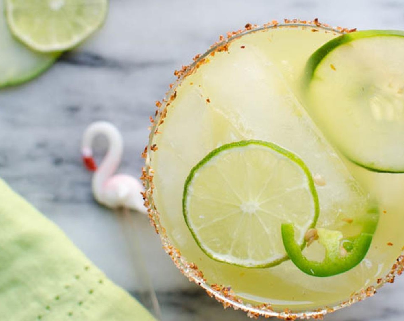 step 8 To a cocktail shaker, add Ice (to taste), reposada tequila and Lime (1 slice). Shake well and pour into glasses with a little ice. Garnish with Cucumber (1 slice), Lime (1 slice) and Kiwifruit (1 slice).