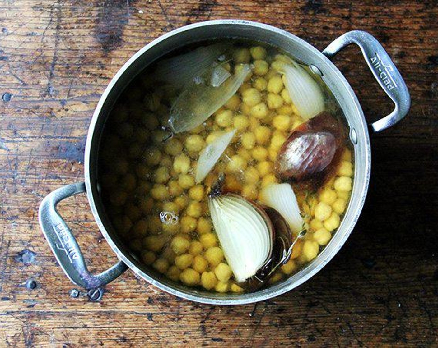 step 3 Bring to a boil, then lower heat and cook at a gentle simmer for about 45 minutes or until the beans are cooked through. Add water as need to ensure the chickpeas are completely covered with water the entire time.