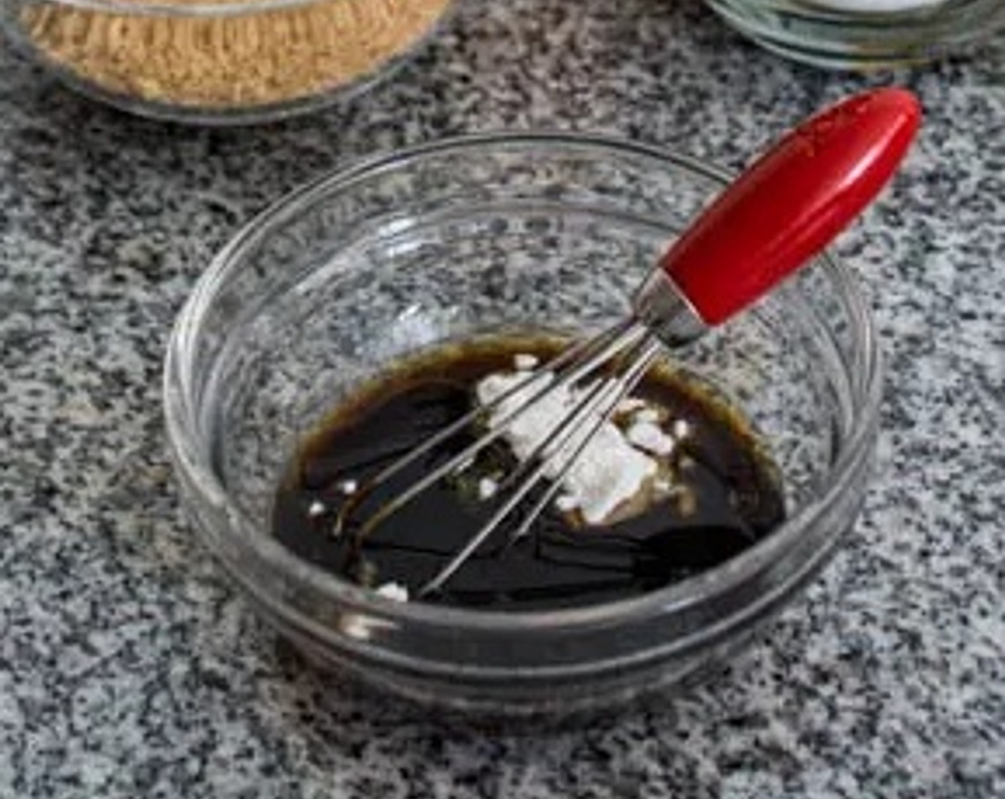 step 2 In a small bowl, prepare the sauce by combining Light Soy Sauce (2 Tbsp), Rice Vinegar (1 Tbsp), Hoisin Sauce (1 Tbsp), Brown Sugar (1/2 Tbsp), Dark Soy Sauce (1 tsp), Sesame Oil (1/2 Tbsp), Corn Starch (1 tsp), and Sriracha (1/2 Tbsp).