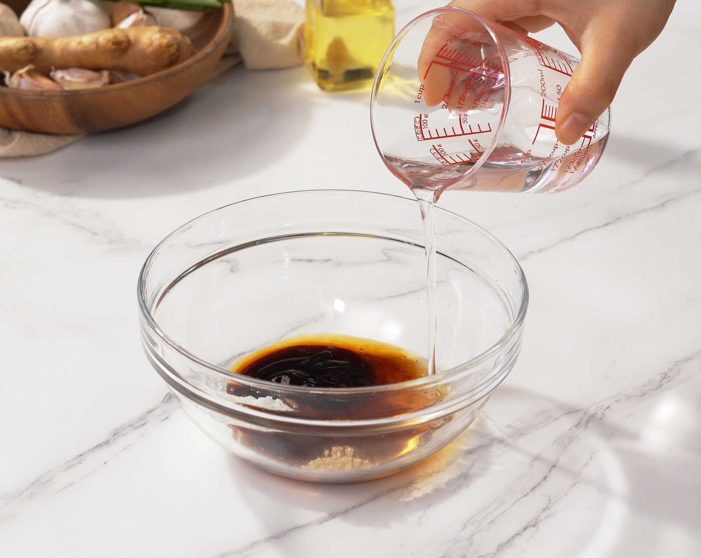 step 3 In a small mixing bowl, combine Water (1/2 cup), Soy Sauce (2 Tbsp), Oyster Sauce (2 Tbsp), Corn Starch (1/2 Tbsp), and Brown Sugar (1/2 Tbsp). Set aside.